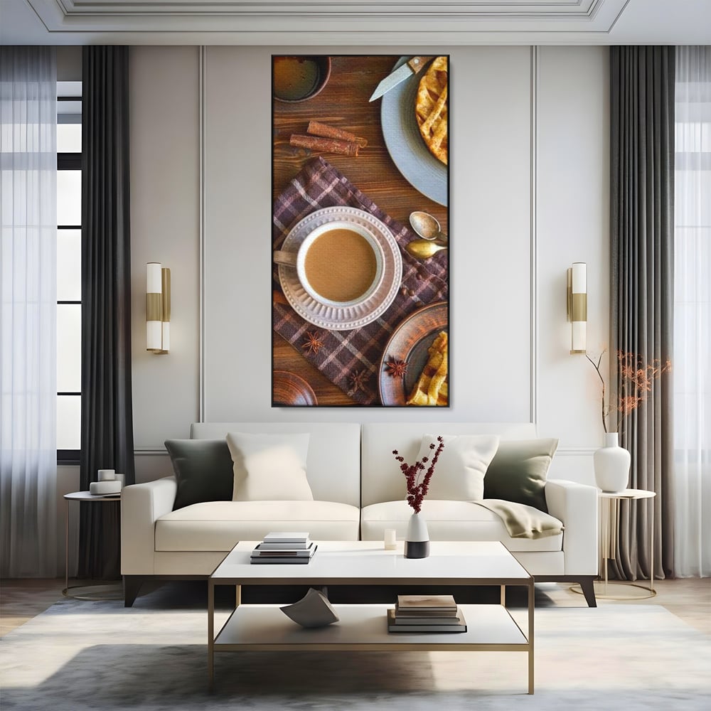 Tablou canvas cu natura moarta cu cafea si placinta, in rama de aluminiu negru, pe perete intr-un living